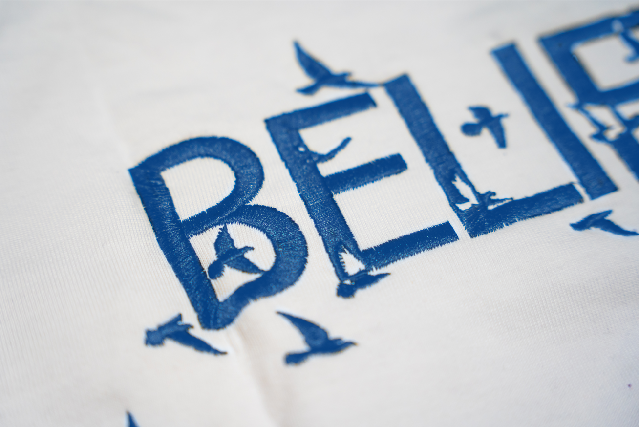 UNREVEALED "Wings of BELIEF" T-Shirt