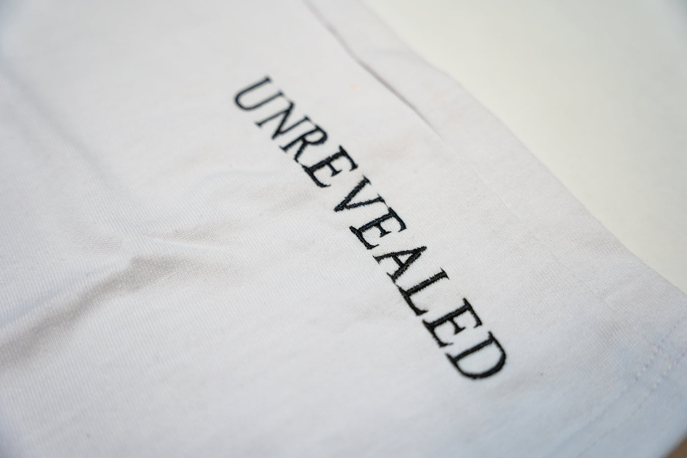 UNREVEALED "Divine Flight" T-Shirt